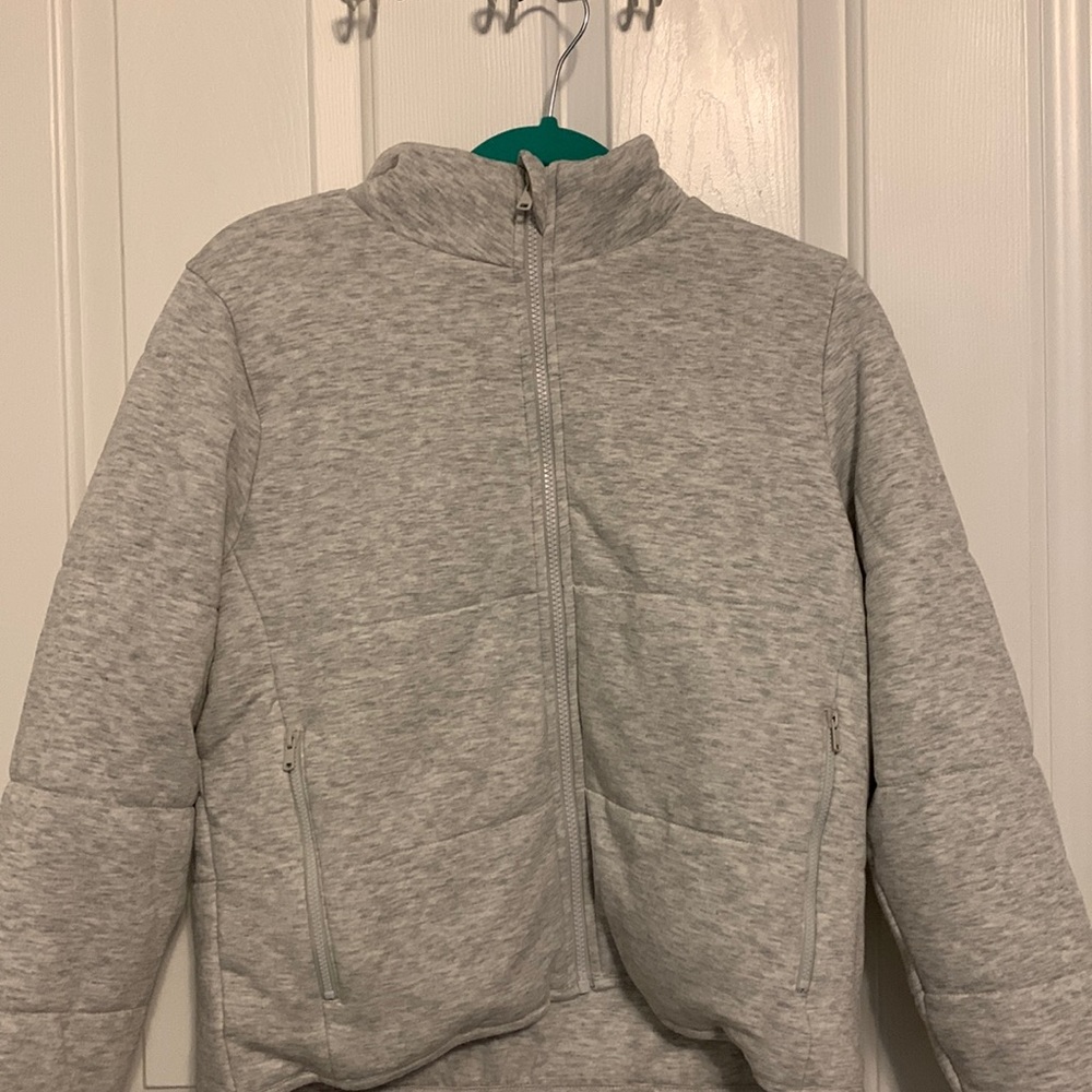 Gray puffer jacket.